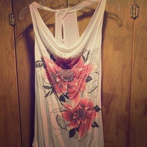 White blouse with flowers on the front